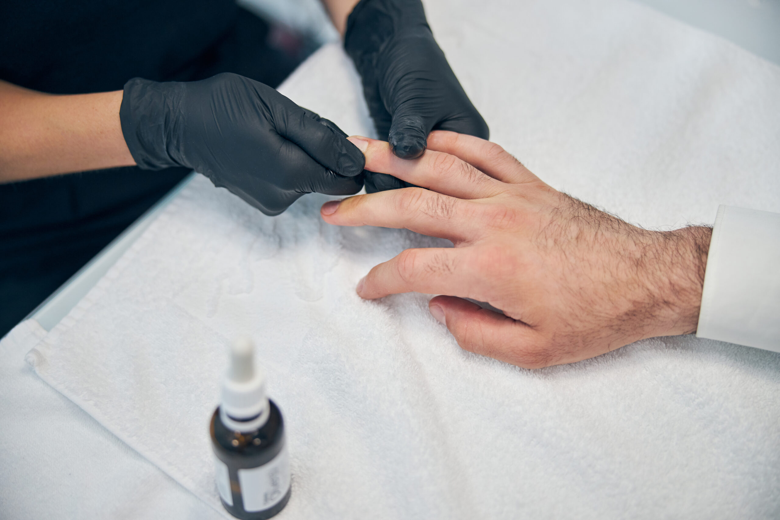 close up of hands while massaging nails 2023 11 27 04 56 55 utc scaled
